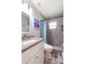 Well-lit bathroom featuring a modern sink and a tiled shower/bath combination perfect for relaxation at 2306 Cheryl Rd, Largo, FL 33771