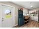 Functional laundry room with ample storage space, a washer, and dryer, for household chores at 2306 Cheryl Rd, Largo, FL 33771