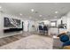 Open-concept living room featuring modern décor, hardwood floors, and ample natural light at 2306 Cheryl Rd, Largo, FL 33771