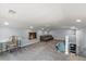 Expansive living room with neutral tones, ample seating, desk space, and recessed lighting, ideal for entertaining guests at 2306 Cheryl Rd, Largo, FL 33771