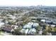 Expansive aerial shot showcases a complex set against a cityscape and lush greenery at 3002 W Cleveland St # B9, Tampa, FL 33609