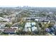 Expansive aerial shot showcases a complex set against a cityscape and lush greenery at 3002 W Cleveland St # B9, Tampa, FL 33609