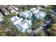 Stunning aerial view showcases complex with vibrant colors, lush trees, and convenient parking at 3002 W Cleveland St # B9, Tampa, FL 33609
