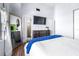 Bright bedroom with a vaulted ceiling and wood-look flooring at 3002 W Cleveland St # B9, Tampa, FL 33609