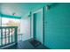 Condo entryway with welcome mat and balcony at 3002 W Cleveland St # B9, Tampa, FL 33609