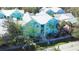 Beautiful exterior with inviting walkway, featuring eye-catching architecture and lush tropical landscaping at 3002 W Cleveland St # B9, Tampa, FL 33609
