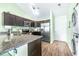 Kitchen featuring stainless steel appliances and granite countertops at 3002 W Cleveland St # B9, Tampa, FL 33609
