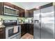 Close up of kitchen appliances, countertops and cabinets at 3002 W Cleveland St # B9, Tampa, FL 33609
