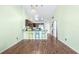 Bright kitchen with stainless steel appliances and breakfast bar at 3002 W Cleveland St # B9, Tampa, FL 33609