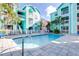 Enjoy the refreshing community pool nestled between vibrant and colorful buildings at 3002 W Cleveland St # B9, Tampa, FL 33609