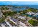 Extensive aerial view featuring a marina, bay, and cityscape, along with a spacious parking lot and lush landscaping at 301 1St S St # 1601, St Petersburg, FL 33701