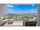 Spacious condo balcony offers seating and expansive views of the water and cityscape at 301 1St S St # 1601, St Petersburg, FL 33701