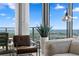Cozy balcony view features comfortable seating and a large potted plant overlooking the beautiful water view at 301 1St S St # 1601, St Petersburg, FL 33701