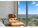 Cozy reading nook with leather chair and ottoman overlooking a beautiful view of the water and city at 301 1St S St # 1601, St Petersburg, FL 33701