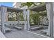 Relaxing cabana area featuring comfortable lounge chairs and privacy curtains for a serene outdoor experience at 301 1St S St # 1601, St Petersburg, FL 33701