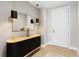 Stylish entryway with modern light fixture, mirror, and decorative console table at 301 1St S St # 1601, St Petersburg, FL 33701