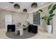 Comfortable lounge area with stylish seating, textured wall paneling, accent lighting, and elegant decor elements at 301 1St S St # 1601, St Petersburg, FL 33701