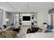 Spacious lounge area with elegant decor, comfortable seating, stylish coffee tables, and views from the windows at 301 1St S St # 1601, St Petersburg, FL 33701