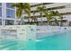 Resort-style pool with unique waterfall feature and comfortable lounge seating offers a relaxing experience at 301 1St S St # 1601, St Petersburg, FL 33701