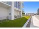 Beautiful rooftop terrace with turf, picnic area, grill, and city views at 301 1St S St # 1601, St Petersburg, FL 33701