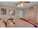 Comfortable bedroom showing a large bed, closet, and decorations at 3106 E Diana St, Tampa, FL 33610