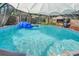 Backyard above-ground pool with inflatable raft and fun accessories, perfect for summer relaxation at 3106 E Diana St, Tampa, FL 33610