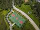 Aerial view of community basketball court and walking path, promoting a healthy outdoor lifestyle at 3150 San Jose St, Clearwater, FL 33759