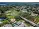 Overhead view of Del Oro Groves Estates, showing the aquatic landscape, mature trees, and community features at 3150 San Jose St, Clearwater, FL 33759