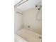 Bathroom features a bathtub and shower with patterned tile surround at 3150 San Jose St, Clearwater, FL 33759