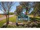 City park featuring lush greenery, trees, and a sign at 3150 San Jose St, Clearwater, FL 33759