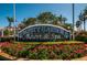 Safety Harbor Resort & Spa entrance sign, set amidst lush floral landscaping at 3150 San Jose St, Clearwater, FL 33759