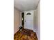 Foyer with tiled floor, 'Welcome' mat, and front door with sidelight window at 3150 San Jose St, Clearwater, FL 33759