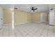 Spacious kitchen area features tile floors and a view to an adjacent room at 3150 San Jose St, Clearwater, FL 33759