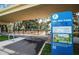 Del Oro Park rules signage, hours of operation, and a map of the park, plus QR code for City of Clearwater at 3150 San Jose St, Clearwater, FL 33759