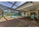 Outdoor patio with screened-in pool at 3150 San Jose St, Clearwater, FL 33759