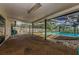 Outdoor patio area with screened-in pool at 3150 San Jose St, Clearwater, FL 33759