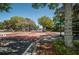 Scenic view of charming street with lush trees, street markings and signs at 3150 San Jose St, Clearwater, FL 33759