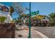 Street view with signs, sidewalks, benches, and brick-paved features at 3150 San Jose St, Clearwater, FL 33759