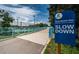 Ream Wilson Trail bridge with trail signage offering a beautiful and pedestrian-friendly community at 3150 San Jose St, Clearwater, FL 33759