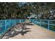 The Ream Wilson Trail's paved bridge lined with blue railings, perfect for a leisurely community walk or bike ride at 3150 San Jose St, Clearwater, FL 33759