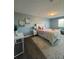Bright bedroom featuring a plush bed, neutral decor, and natural light, creating a relaxing atmosphere at 3315 58Th S Ave # 421, St Petersburg, FL 33712