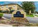 Kings Mill Townhomes community sign showing well-maintained landscaping and stone detail for a welcoming entrance at 3455 Castle Stone Ct, Valrico, FL 33594