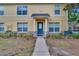 Charming two-story home featuring a welcoming entrance, neutral color palette, and well-maintained landscaping at 3455 Castle Stone Ct, Valrico, FL 33594