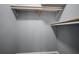 A walk-in closet with built-in shelving for optimal organization and storage space at 37732 Cecil Ln, Zephyrhills, FL 33542