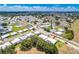 A beautiful aerial view of the neighborhood and surrounding trees at 4076 Mainlands N Blvd, Pinellas Park, FL 33782