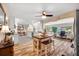Open-concept kitchen with island seating, stainless appliances, and seamless flow to the living spaces at 4076 Mainlands N Blvd, Pinellas Park, FL 33782