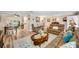 Open-concept living room flowing seamlessly into the dining area and kitchen with a relaxing atmosphere at 4076 Mainlands N Blvd, Pinellas Park, FL 33782