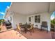 Inviting covered patio with outdoor seating, ideal for relaxation and entertaining guests at 4076 Mainlands N Blvd, Pinellas Park, FL 33782