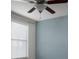 Bedroom that has a ceiling fan and large windows at 4146 Bexley Village Dr, Land O Lakes, FL 34638