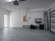 Spacious two-car garage with ample storage space and lighting at 4146 Bexley Village Dr, Land O Lakes, FL 34638